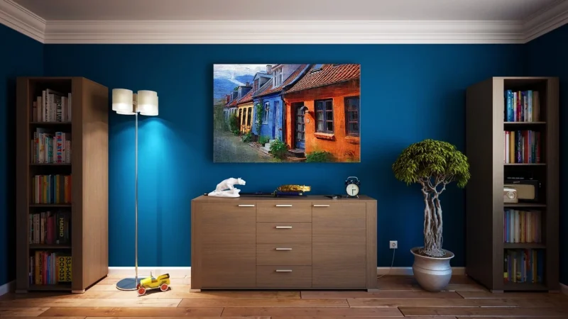 Granatowa sofa z funkcją spania — styl i komfort do salonu